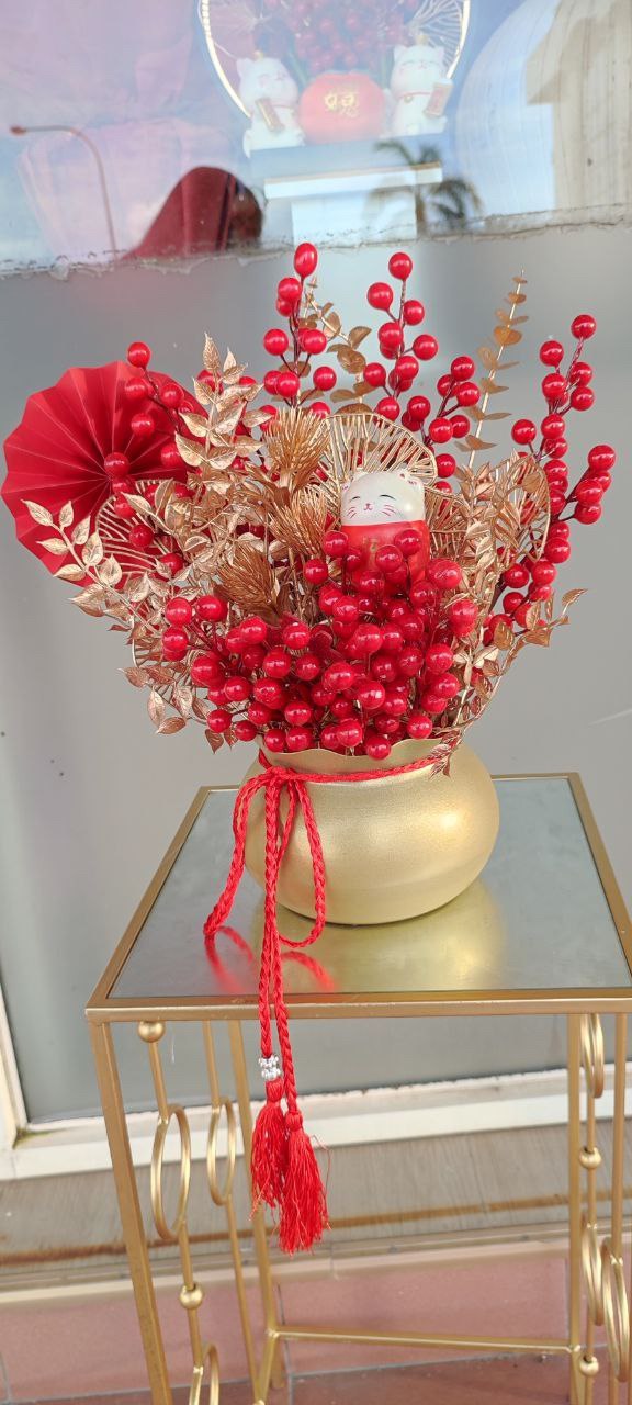 TI CNY GOLD POT W ARTIFICIAL ARRANGEMENT $55
